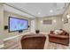 Home theater room with a large screen, comfortable seating, and surround sound at 660 Briarleigh Way, Woodstock, GA 30189