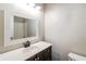 Modern bathroom with decorative mirror, modern vanity, and bathtub with shower at 937 Ohara Drive Dr, Jonesboro, GA 30236