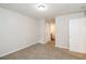 Bedroom featuring neutral carpet, a ceiling light, and two closets at 937 Ohara Drive Dr, Jonesboro, GA 30236