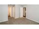 Bedroom featuring neutral carpet, a ceiling light, and three closets at 937 Ohara Drive Dr, Jonesboro, GA 30236