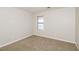 Bedroom featuring neutral carpet, natural light from a window, and neutral paint at 937 Ohara Drive Dr, Jonesboro, GA 30236