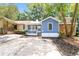 Charming home featuring blue siding, white trim, and a well-manicured front yard at 937 Ohara Drive Dr, Jonesboro, GA 30236
