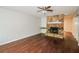 Cozy living room featuring hardwood floors and a stone fireplace with mantle at 937 Ohara Drive Dr, Jonesboro, GA 30236