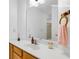 Bathroom vanity with light counter tops, and a large mirror at 1574 Glenfield Dr, Lawrenceville, GA 30043