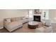 Comfortable living room features neutral tones, fireplace, and plenty of natural light at 1574 Glenfield Dr, Lawrenceville, GA 30043