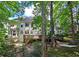 Beautifully landscaped backyard featuring trees and a hammock at 1620 Silverleaf Way, Alpharetta, GA 30005