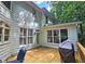 Backyard featuring a well-maintained deck, ideal for outdoor dining at 1620 Silverleaf Way, Alpharetta, GA 30005