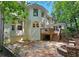 Backyard and patio overlooking the backyard landscaping at 1620 Silverleaf Way, Alpharetta, GA 30005