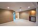 Finished basement features a wet bar with a mini refrigerator and granite counter at 1620 Silverleaf Way, Alpharetta, GA 30005