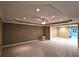Open unfinished basement with neutral walls, carpet, recessed lighting and ceiling fan at 1620 Silverleaf Way, Alpharetta, GA 30005