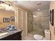Bathroom with elegant marble counter, a glass shower and modern fixtures at 1620 Silverleaf Way, Alpharetta, GA 30005