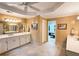 Bathroom features dual sinks, vanity, and tiled flooring at 1620 Silverleaf Way, Alpharetta, GA 30005