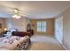 Spacious bedroom featuring carpet flooring, neutral walls, and window providing lots of natural light at 1620 Silverleaf Way, Alpharetta, GA 30005