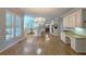 Spacious kitchen provides granite countertops, stainless steel appliances, and access to the dining area at 1620 Silverleaf Way, Alpharetta, GA 30005