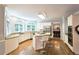 Bright kitchen boasts granite countertops, stainless steel appliances, and a convenient breakfast bar at 1620 Silverleaf Way, Alpharetta, GA 30005