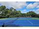 Brightly colored tennis courts ready for a match, enjoy the outdoors in this community at 1620 Silverleaf Way, Alpharetta, GA 30005