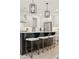 Stylish kitchen island with pendant lights, bar stools, and stainless steel appliances at 2718 Byess Ct, Marietta, GA 30064