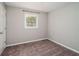 Bedroom with a neutral color palette, carpet, and ample natural light at 409 Colette Ln, Social Circle, GA 30025