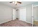 Bedroom with carpet, natural lighting, and closet at 409 Colette Ln, Social Circle, GA 30025