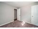 Bedroom featuring carpet and doorway to closet at 409 Colette Ln, Social Circle, GA 30025