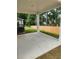 Covered back patio with backyard view and wooden fence at 4856 Station Road-Lot 21, Union City, GA 30349