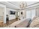 Elegant bedroom with hardwood floors, modern lighting, and luxurious finishes at 1049 Brandsford Nw St # 27-01, Atlanta, GA 30318