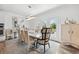 Bright dining room with stylish furnishings, designer lighting, and access to a private outdoor area at 1049 Brandsford Nw St # 27-01, Atlanta, GA 30318