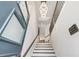 Elegant entryway with a grand staircase and a modern chandelier that makes a memorable first impression at 1049 Brandsford Nw St # 27-01, Atlanta, GA 30318