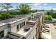 Stunning aerial view showcases townhome rooftop patios with outdoor seating and solar panels at 1049 Brandsford Nw St # 27-01, Atlanta, GA 30318