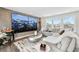 Comfortable living room with a large sectional sofa, area rug, and large wall monitor at 1049 Brandsford Nw St # 27-01, Atlanta, GA 30318