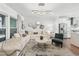 Cozy living room features a large sectional sofa, modern lighting, and beautiful decor at 1049 Brandsford Nw St # 27-01, Atlanta, GA 30318