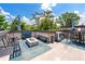 Inviting outdoor seating area with a fire pit, perfect for entertaining or relaxing with scenic views at 1049 Brandsford Nw St # 27-01, Atlanta, GA 30318