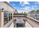 Outdoor patio with dining set and neighborhood views at 1049 Brandsford Nw St # 27-01, Atlanta, GA 30318