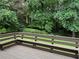 View of a peaceful wooded backyard with lush greenery from the back deck at 2181 Rodao Sw Dr, Lilburn, GA 30047