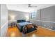 Inviting bedroom with hardwood floors, ceiling fan and natural light at 2965 Pharr Court South Nw # 817, Atlanta, GA 30305