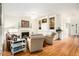 Cozy living room with a fireplace, built-in bookshelves, and comfortable seating at 1884 Whitehawk Ct, Lawrenceville, GA 30043