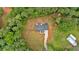 Aerial shot of a home on a large wooded lot with a fenced-in backyard at 3088 Hiram Sudie Road, Hiram, GA 30141
