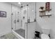 Modern bathroom featuring a glass shower with subway tile, and decorative floor at 3088 Hiram Sudie Road, Hiram, GA 30141