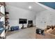 Upstairs bonus room with a low ceiling, built-in shelves, and two closets at 3088 Hiram Sudie Road, Hiram, GA 30141