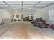 An oversized garage with an unfinished floor offering ample workspace and storage possibilities at 3088 Hiram Sudie Road, Hiram, GA 30141