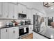 Well-equipped kitchen with stainless steel appliances and ample counter space at 3088 Hiram Sudie Road, Hiram, GA 30141