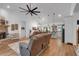 Open-concept living space with hardwood floors and a glimpse of the kitchen at 3088 Hiram Sudie Road, Hiram, GA 30141