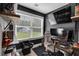 Office space with sleek dark walls, natural light, and a dedicated work area at 3088 Hiram Sudie Road, Hiram, GA 30141