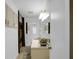 A bathroom with a vanity, mirror, and decorative shower curtain at 3835 Clearwater Dr, Atlanta, GA 30349