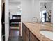 Bathroom featuring a double vanity and a glimpse into the bedroom at 3835 Clearwater Dr, Atlanta, GA 30349