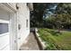 Exterior of home has a well-maintained lawn and lots of greenery at 3835 Clearwater Dr, Atlanta, GA 30349