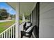 Inviting front porch featuring comfortable seating, perfect for relaxing outdoors at 3835 Clearwater Dr, Atlanta, GA 30349