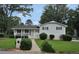 Lovely home with a welcoming front porch, tidy landscaping, and a well-maintained lawn at 3835 Clearwater Dr, Atlanta, GA 30349