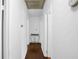 A bright hallway with hardwood floors and an open doorway at 3835 Clearwater Dr, Atlanta, GA 30349