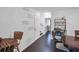 Bright hallway leads to different rooms in the house; note the message on the wall at 3835 Clearwater Dr, Atlanta, GA 30349